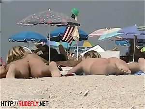 light-haired model nudist on the nude beach hidden cam flick